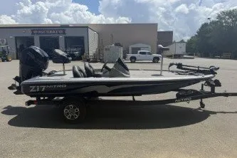 Slide: The Image of 2026 Nitro Z17 boat on trailer in outdoor setting. - 2