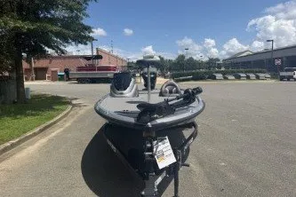 Slide: The Image of 2026 Nitro Z17 boat parked outdoors on a sunny day. - 1