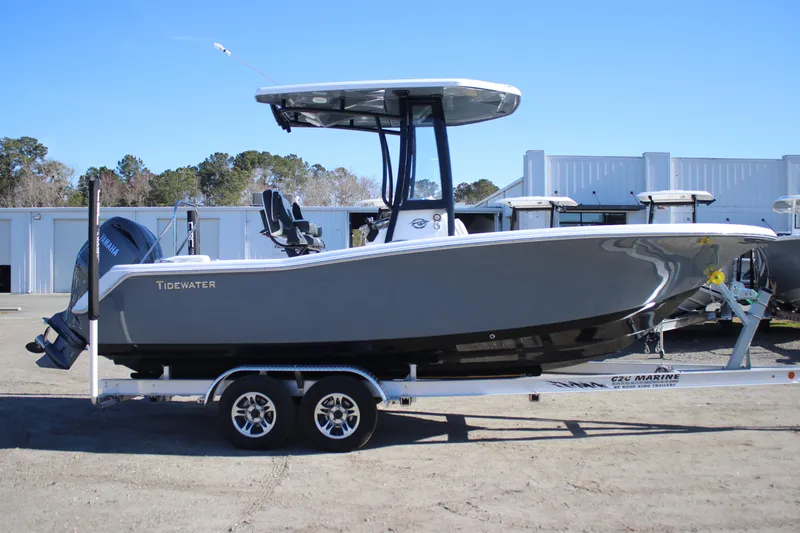The Image of 2026 Tidewater 220 LXF boat on trailer, side view, outdoors. - 0