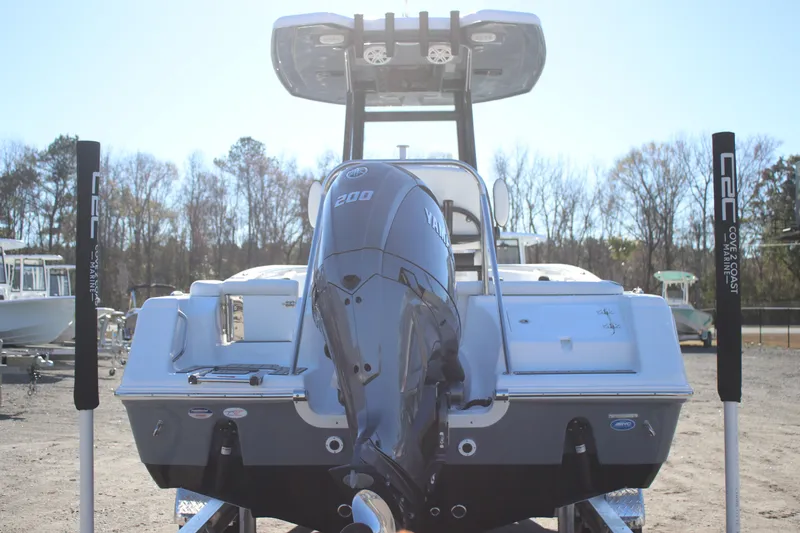 Slide: The Image of 2026 Tidewater 220 LXF boat with Yamaha 200 engine, displayed outdoors. - 4