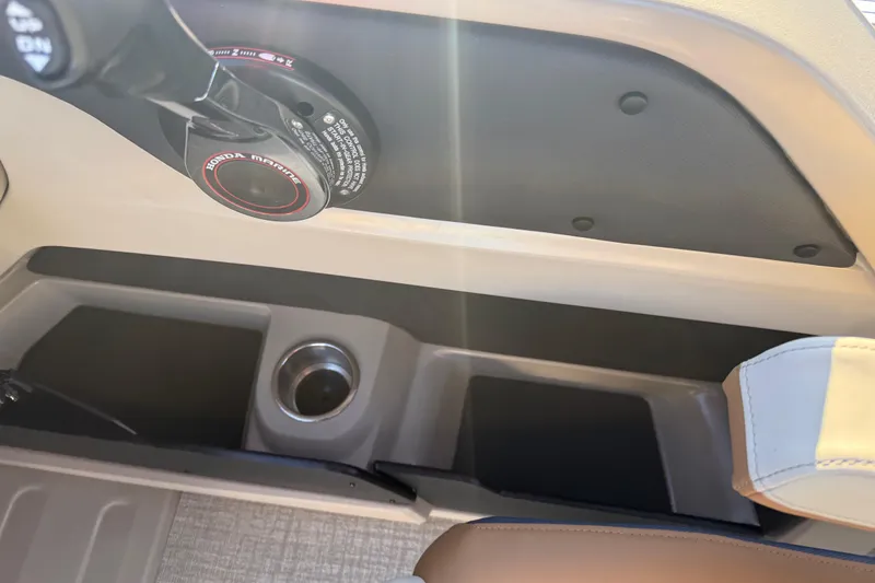 Slide: The Image of Interior of 2026 Avalon LSZ Quad Lounger Shift with Honda Marine controls. - 20