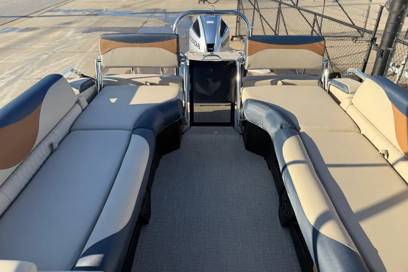 Slide: The Image of 2026 Avalon LSZ Quad Lounger Shift boat interior with luxurious seating and modern design. - 22
