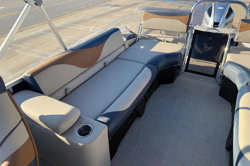 Slide: The Image of 2026 Avalon LSZ Quad Lounger Shift boat interior with plush seating and modern design. - 24
