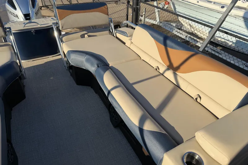 Slide: The Image of 2026 Avalon LSZ Quad Lounger Shift boat interior with comfortable seating and modern design. - 27