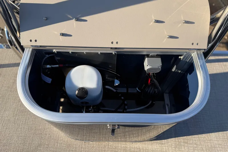 Slide: The Image of 2026 Avalon LSZ QUAD LOUNGER SHIFT storage compartment with open lid, showcasing interior components. - 31