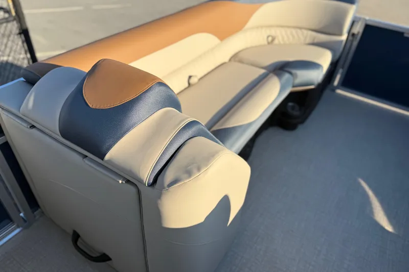 Slide: The Image of 2026 Avalon LSZ Quad Lounger Shift boat seating, featuring luxurious beige and blue upholstery. - 37