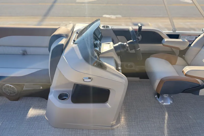 Slide: The Image of 2026 Avalon LSZ Quad Lounger Shift boat interior with modern helm and comfortable seating. - 41