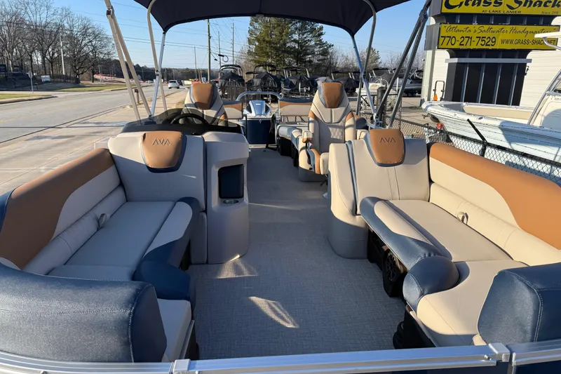 Slide: The Image of 2026 Avalon LSZ Quad Lounger Shift pontoon boat with luxurious seating and canopy. - 6
