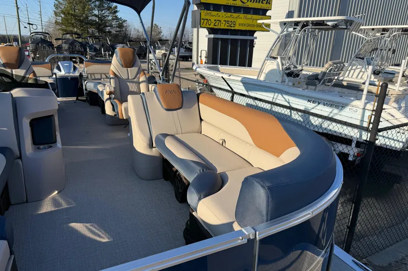 Slide: The Image of 2026 Avalon LSZ Quad Lounger Shift pontoon boat with luxurious seating and modern design. - 7