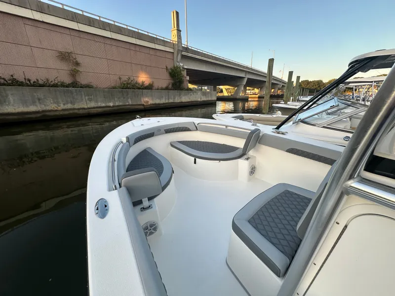 Slide: The Image of 2024 Defiance 240 Catalina boat at dock, modern seating. - 10