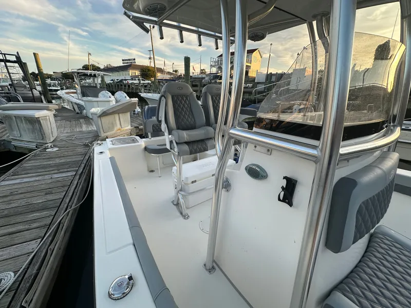 Slide: The Image of 2024 Defiance 240 Catalina boat at dock, interior view. - 13