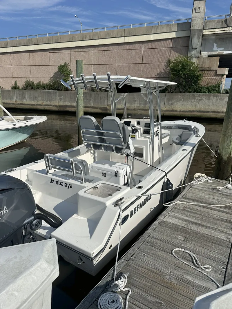 Slide: The Image of 2024 Defiance 240 Catalina boat docked at marina. - 4