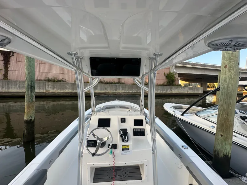 Slide: The Image of Interior view of 2024 Defiance 240 Catalina boat at dock. - 6