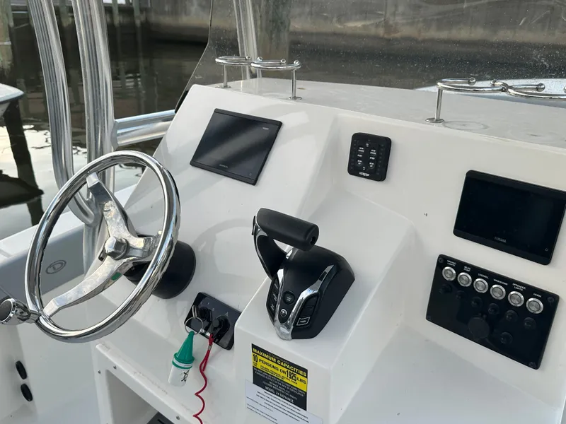 Slide: The Image of Defiance 240 Catalina 2024 helm with modern electronics. - 7