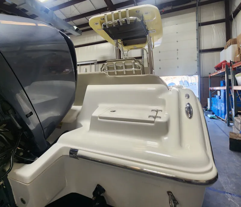 Slide: The Image of 2024 Key West 239 FS boat in a warehouse. - 10