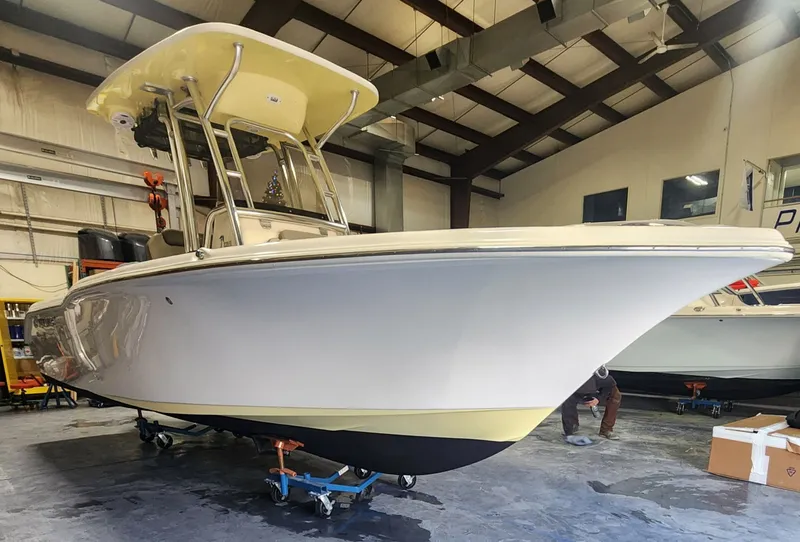 Slide: The Image of 2024 Key West 239 FS boat in a workshop. - 11