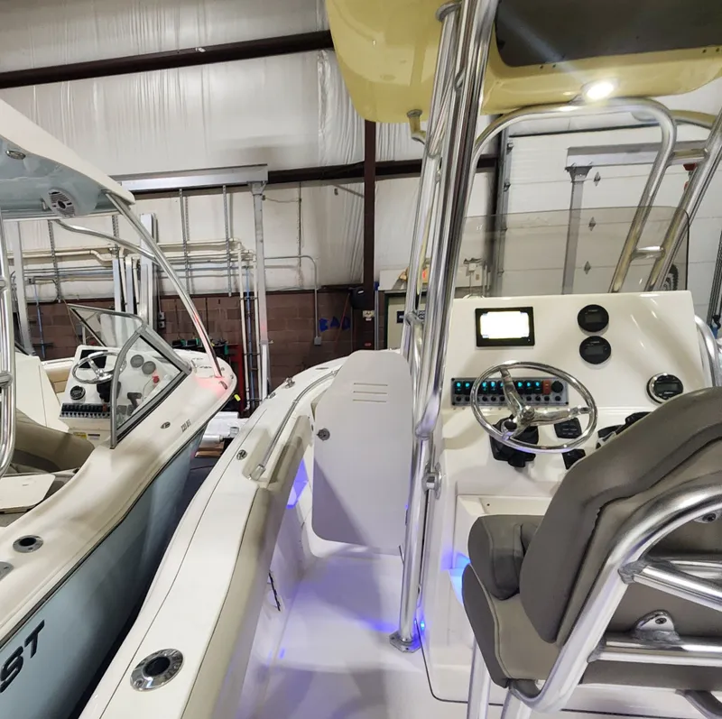 Slide: The Image of Interior view of a 2024 Key West 239 FS boat in storage. - 12