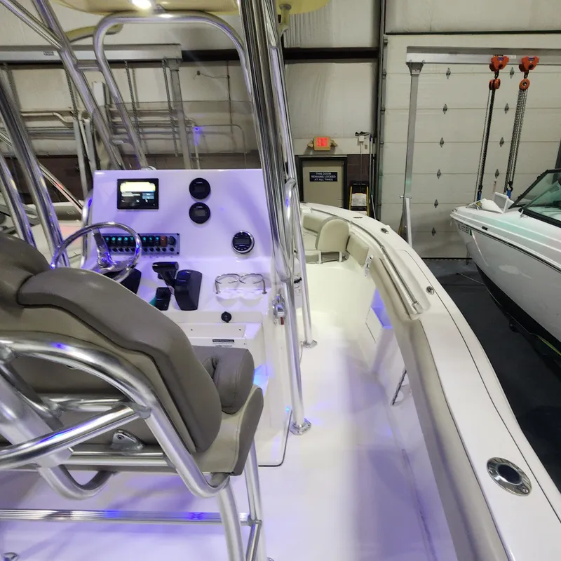 Slide: The Image of Interior view of 2024 Key West 239 FS boat in warehouse. - 15