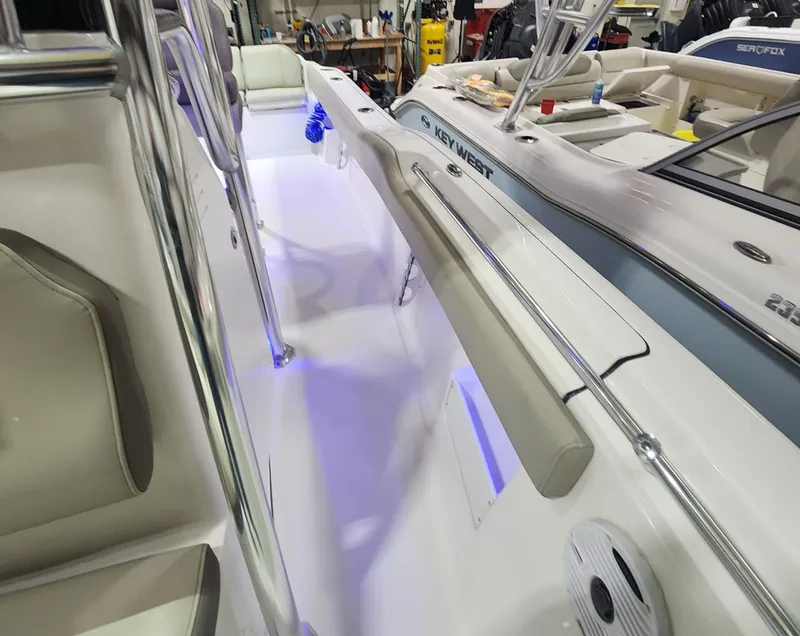 Slide: The Image of Interior view of 2024 Key West 239 FS boat in showroom. - 16