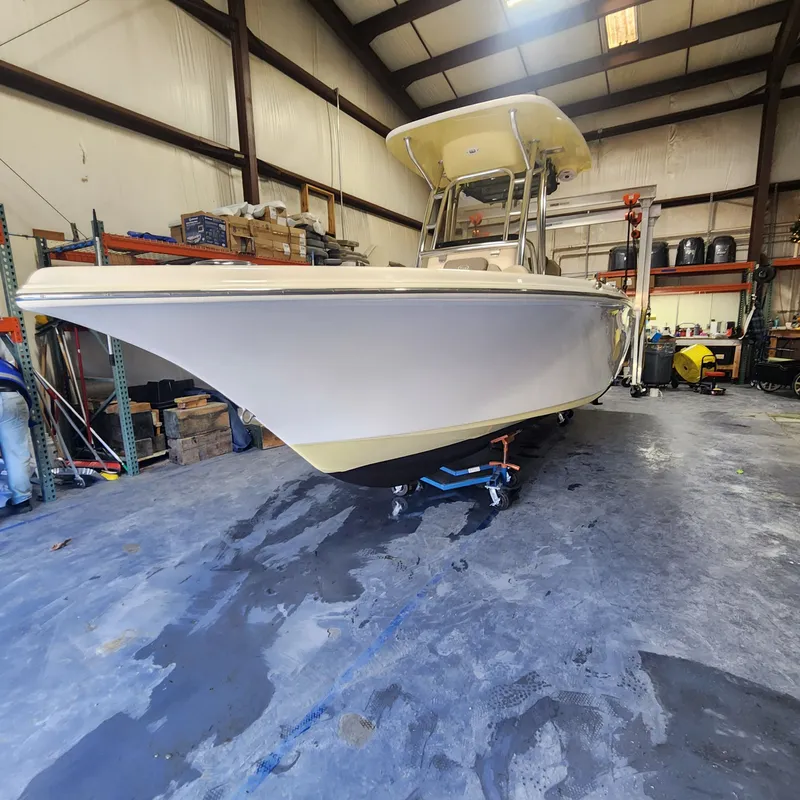 Slide: The Image of 2024 Key West 239 FS boat in a workshop. - 3
