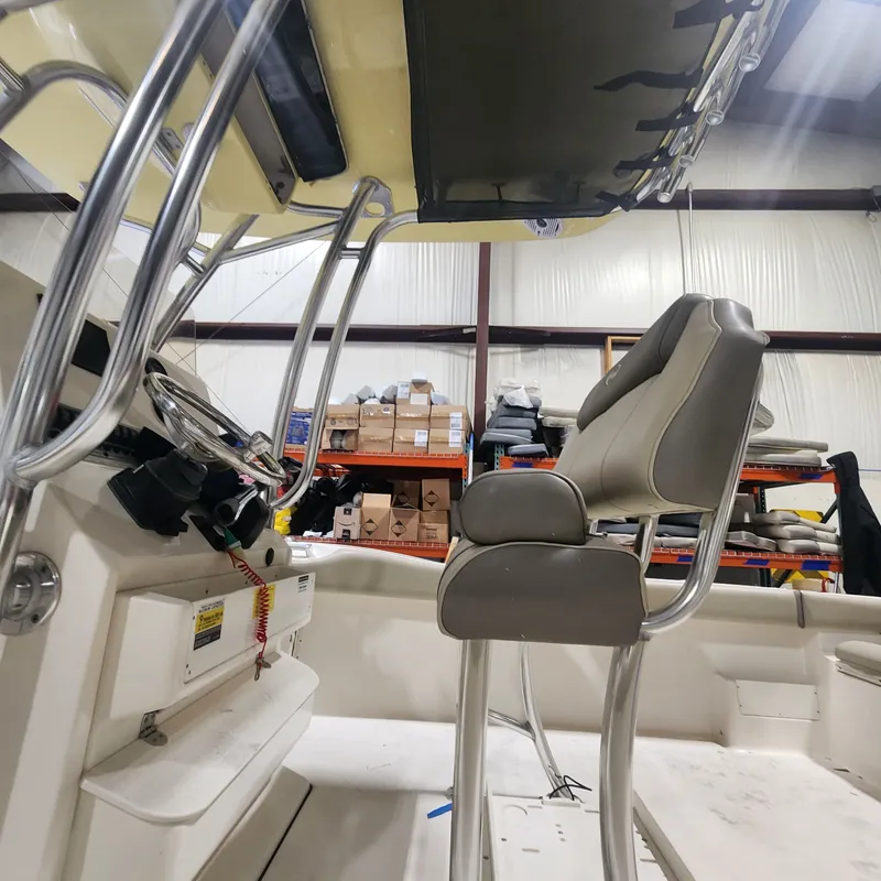 Slide: The Image of Interior view of 2024 Key West 239 FS boat with seat and helm. - 8