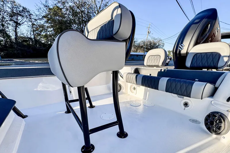 Slide: The Image of 2026 ALK2 23 CRX boat interior with modern seating and sleek design. - 11
