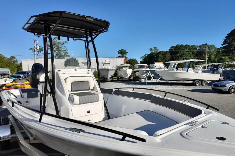 Slide: The Image of 2026 ALK2 Powerboats 23 CRX, sleek design, parked outdoors, clear blue sky. - 14