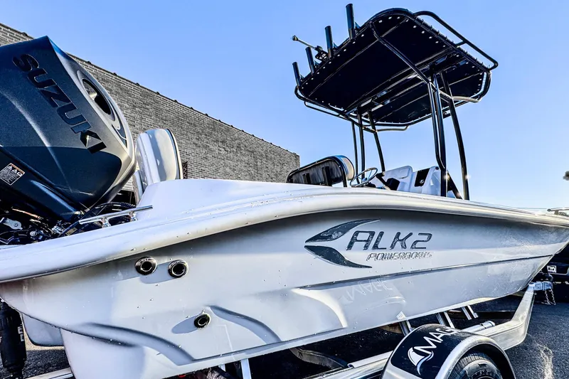 Slide: The Image of 2026 ALK2 23 CRX powerboat with Suzuki engine, sleek design, and modern features. - 2