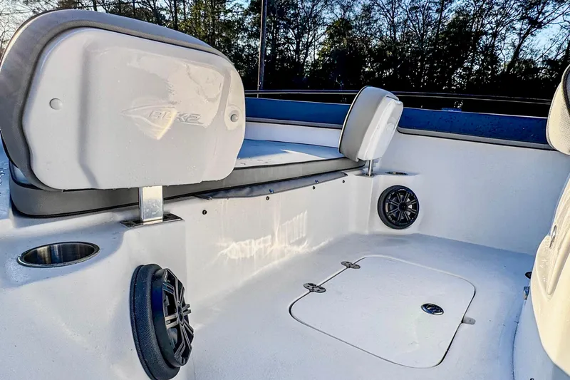 Slide: The Image of Interior of 2026 ALK2 23 CRX boat with seating and speakers. - 7
