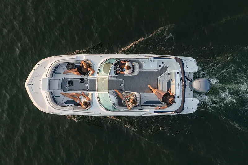 Slide: The Image of Manufacturer Provided Image: Aerial view of 2021 Hurricane SunDeck 2400 OB boat with passengers on water. - 4