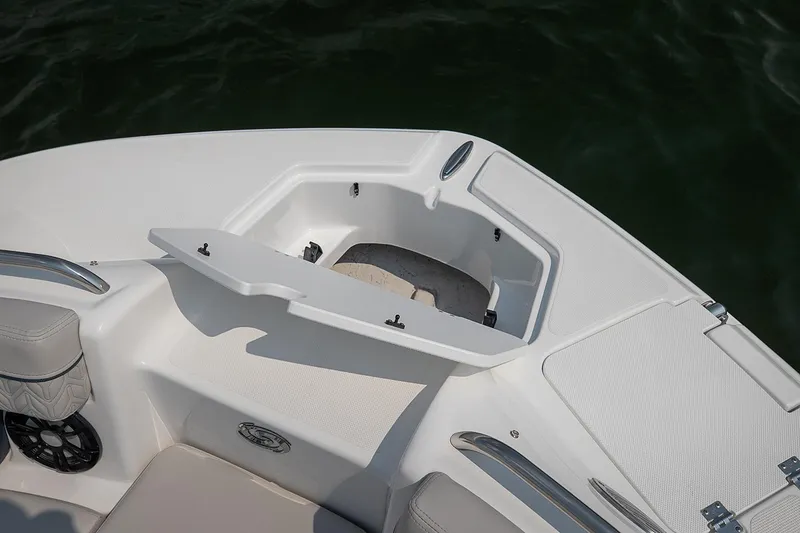 Slide: The Image of Manufacturer Provided Image: 2021 Hurricane SunDeck 2400 OB boat storage compartment with open lid. - 7