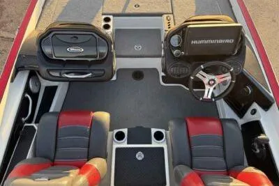 Slide: The Image of 2015 Triton 22 TrX boat interior with dual seats and Hummingbird electronics. - 8