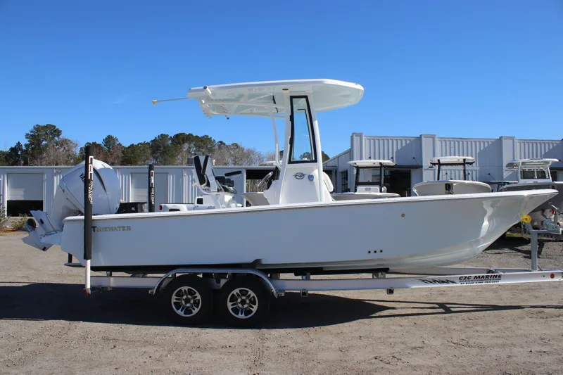 The Image of 2026 Tidewater 2300 Carolina Bay boat on trailer, parked outdoors. - 0