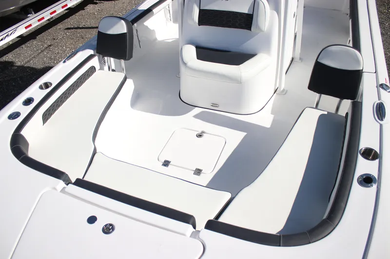 Slide: The Image of 2026 Tidewater 2300 Carolina Bay boat interior with seating and storage compartments. - 27