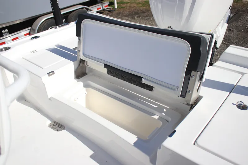 Slide: The Image of 2026 Tidewater 2300 Carolina Bay boat with open storage compartment. - 30