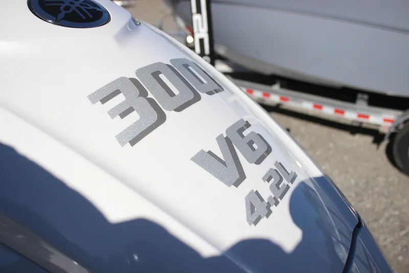 Slide: The Image of Close-up of a Yamaha 300 V6 4.2L engine on a 2026 Tidewater 2300 Carolina Bay boat. - 31