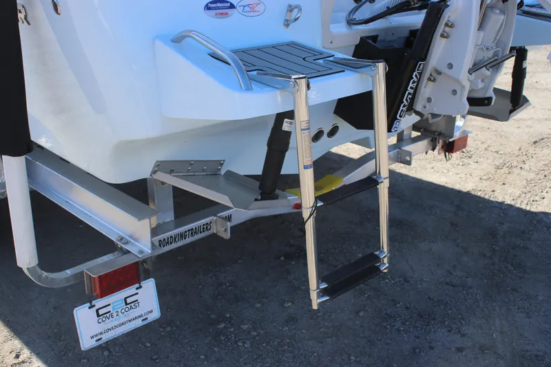 Slide: The Image of 2026 Tidewater 2300 Carolina Bay boat with ladder and trailer detail. - 9