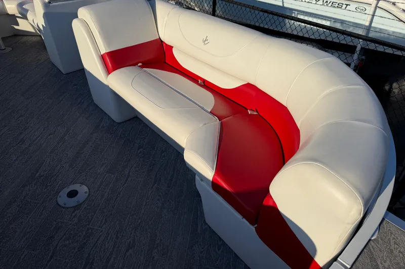 Slide: The Image of Luxurious white and red seating on 2021 JC Spirit 221TT boat. - 14