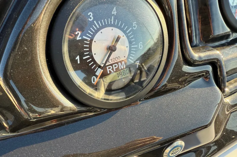 Slide: The Image of Close-up of 2021 JC Spirit 221TT RPM gauge showing 196 hours. - 23