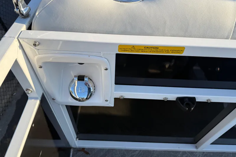 Slide: The Image of Fuel cap and caution label on 2021 JC Spirit 221TT boat. - 32