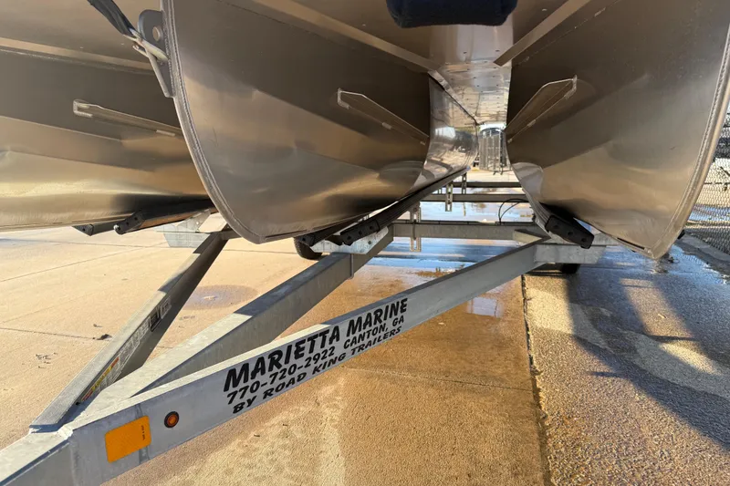 Slide: The Image of Trailer for 2021 JC Spirit 221TT boat at Marietta Marine dealership. - 5