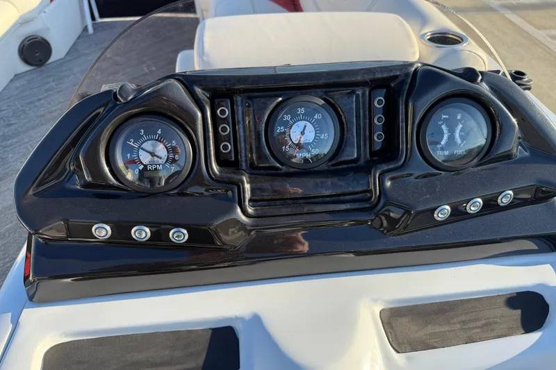 Slide: The Image of Dashboard of 2021 JC Spirit 221TT boat with RPM, speed, and fuel gauges. - 22