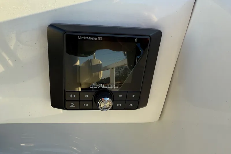 Slide: The Image of JL Audio MediaMaster 50 installed on 2021 JC Spirit 221TT boat. - 24