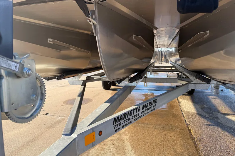 Slide: The Image of Underneath view of 2021 JC Spirit 221TT pontoon boat on trailer. - 6