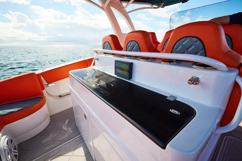 Slide: The Image of Luxury seating on Midnight Express 43 Open boat with ocean view. - 18