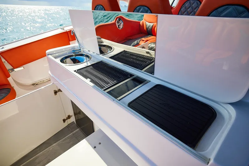 Slide: The Image of Luxury boat interior with sleek kitchen area on Midnight Express 43 Open. - 19