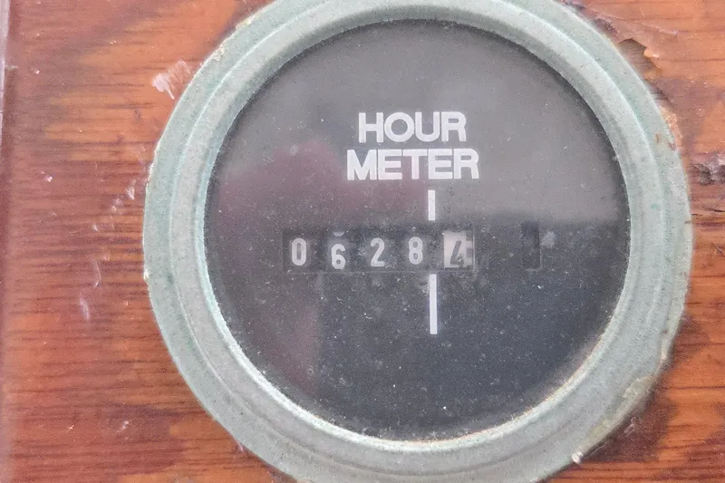 Slide: The Image of Hour meter reading 06284 on 1982 SISU 26, mounted on wooden panel. - 18