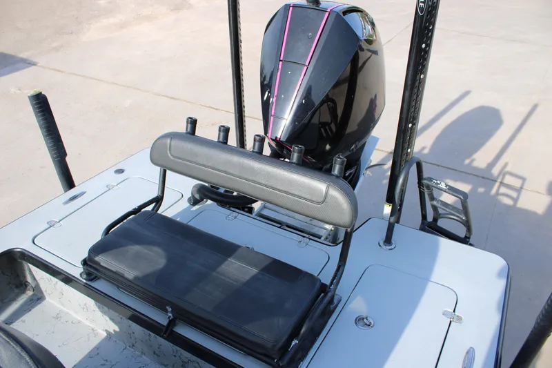 Slide: The Image of 2024 Mamba 24VX boat with sleek black motor and comfortable seating. - 11