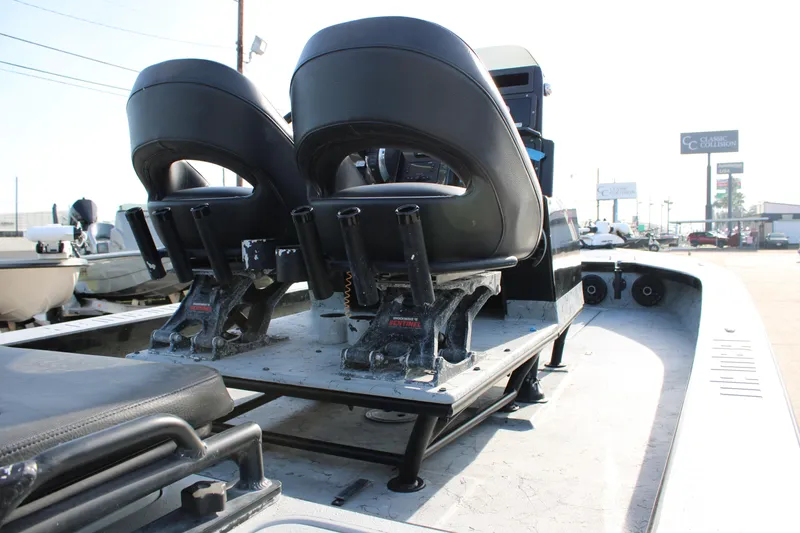 Slide: The Image of 2024 Mamba 24VX boat interior with dual seats and control panel. - 12