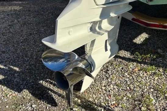 Slide: The Image of 2020 Sea Chaser 22HFC boat propeller on gravel surface, showcasing sleek design. - 13